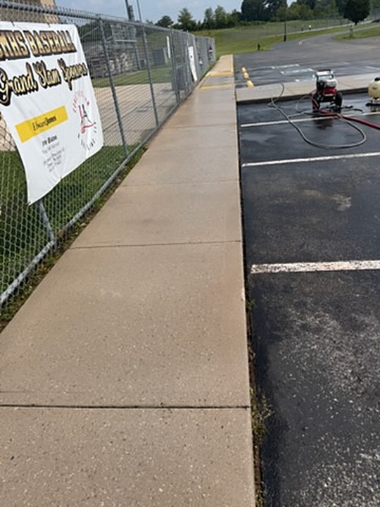 The same walkway after hot water washing, clean and even along the full run